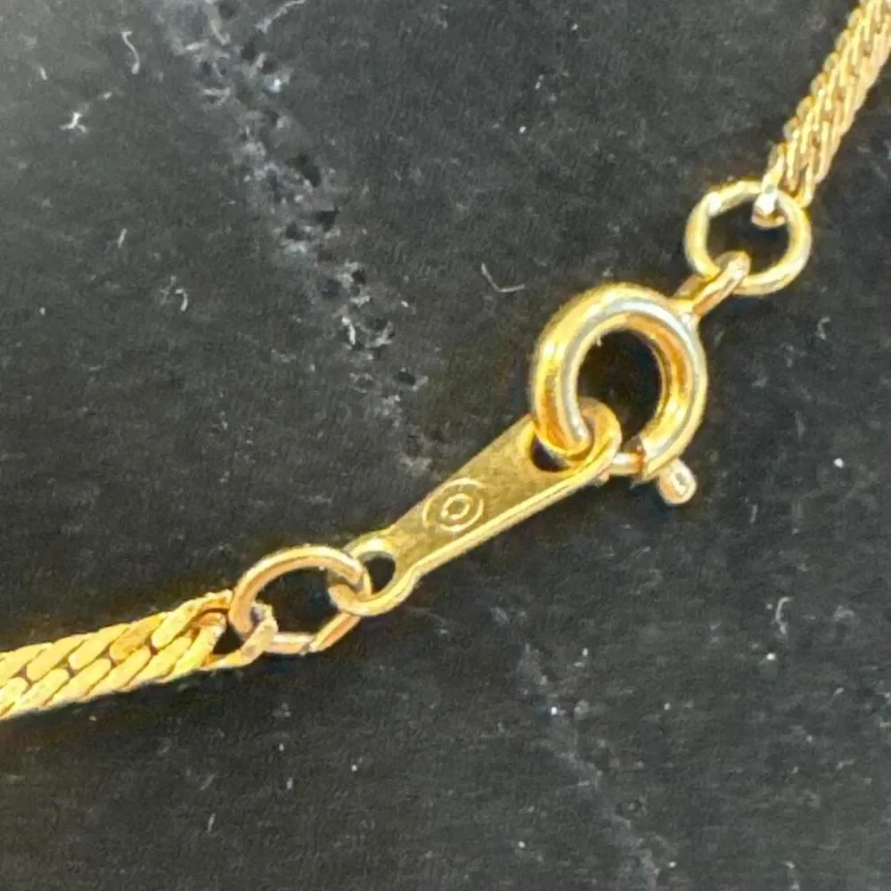 Source Unknown gold tone